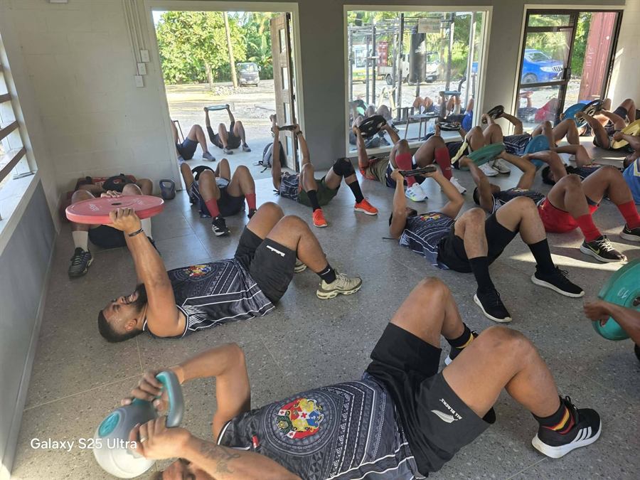 Group fitness class with the doors open to nature